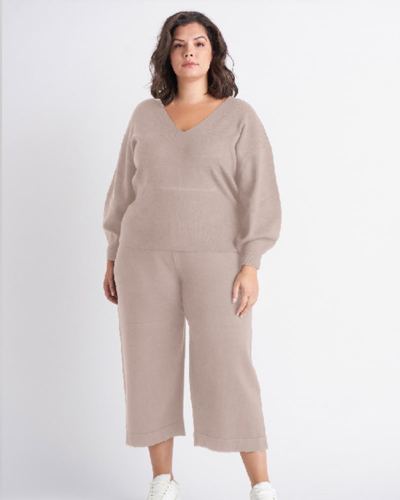 Front of a model wearing a plus size Kate Relaxed Fit Knit Sweater in Taupe by DEX PLUS. | dia_product_style_image_id:268406
